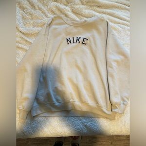 “nike” sweatshirt